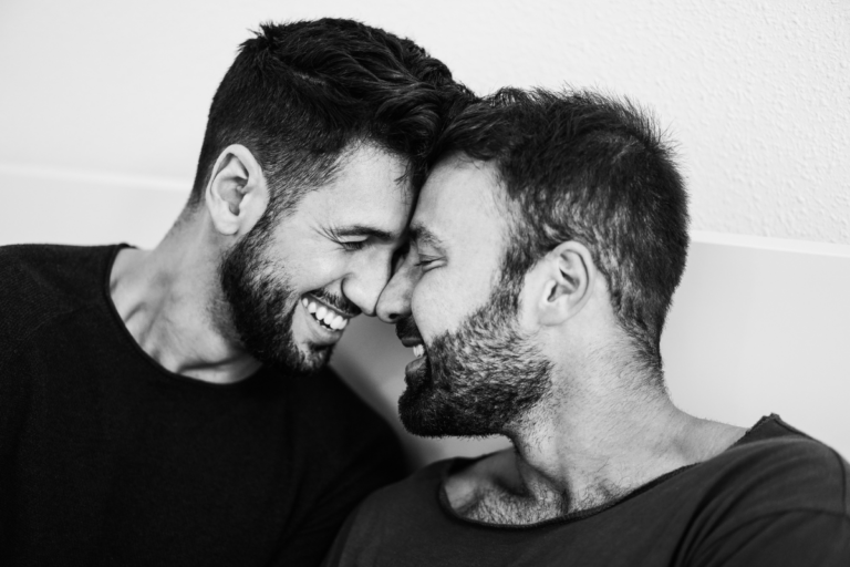Gay Couple embracing each other.