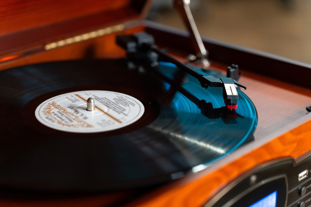 A close up of a vinyl spinning on a record player.