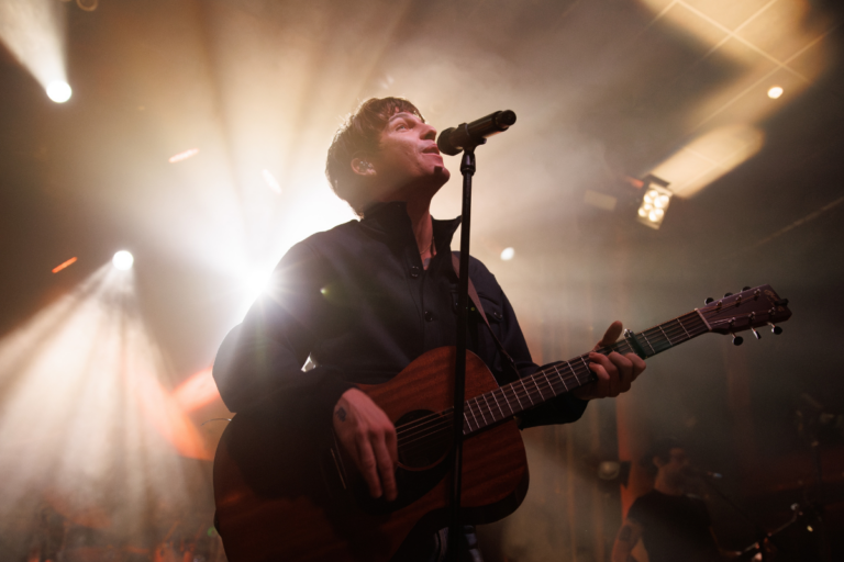 Role Model performing live on stage.