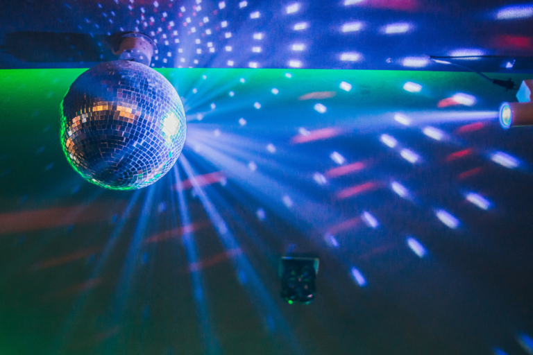 A close up of a disco ball at a school dance.