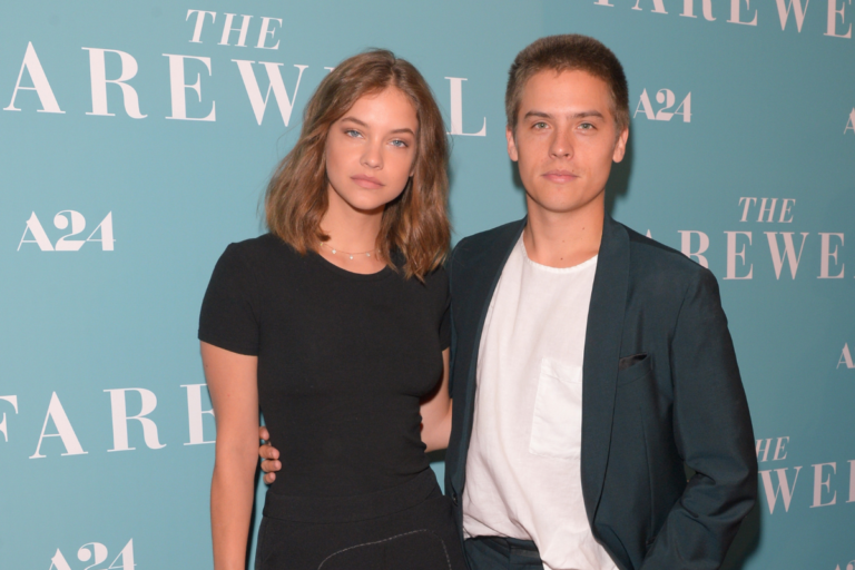Dylan Sprouse and Barbara Palvin on a red carpet.