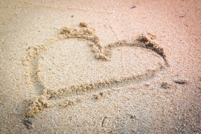 A heart drawn on the beach.
