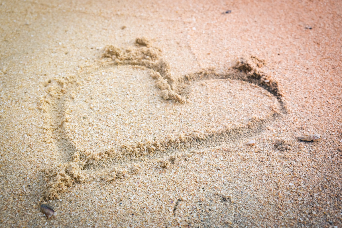A heart drawn on the beach.