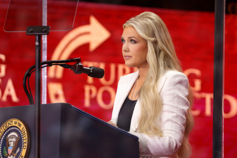 Erika Kirk speaking at an event.